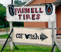 Sign for tires and car wash. Parnell Tires, Birmingham, Alabama-Roadside Art
