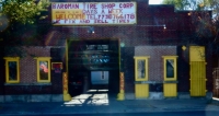 Storefront with hand-lettered sign, Baroman Tire Shop, 47th Street near Bishop, Chicago-Roadside Art
