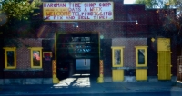 Storefront with hand-lettered sign, Baroman Tire Shop, 47th Street near Bishop, Chicago-Roadside Art Storefront with hand-lettered sign, Baroman Tire Shop, 47th Street near Bishop, Chicago-Roadside Art