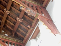 Saint on the 15th century roof, St. John the Baptist Church, Bere Regis, England