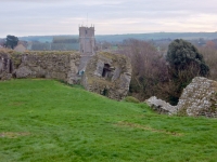 Collapsed walls and nearby church tower, Corfe Castle