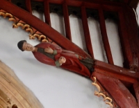 Saint on the 15th century roof, St. John the Baptist Church, Bere Regis, England