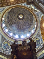 Dome and the top of Bernini's massive bronze baldacchino, St. Peter's