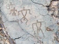 Three male triangle figures from the Waikoloa petroglyphs in Hawaii Three male triangle figures from the Waikoloa petroglyphs in Hawaii