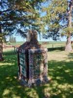 Corner view. Father Paul Dobberstein's war memorial, Old Rolfe, Iowa