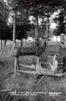 Fred Smith and deer sculpture at his Wisconsin Concrete Park,  Phillips, postcard