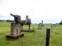 E.T. Wickham's statues in their new location on Oak Ridge Road in Palmyra, Tennessee.