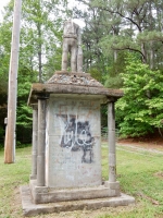 E.T. Wickham: World War II memorial in the original Buck Smith Road location. "Built by E.T. Wickham 1959 this monument is built in honor of all men who have gone forth by land, sea or air to face almost certain death, especially these gallant men from 18th ,19th & 20th District of Montgomery County Tennessee who sacrificed their lives in action and whose names are inscribed here. May we forever retain this freedom."