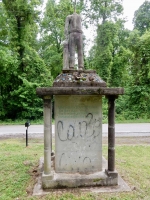 E.T. Wickham: Back of the World War II memorial. "Whether on scaffolds high or battles van the fittest place for man to die is where he dies for man."