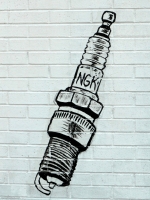Spark plug painting on wall. Ozco Auto Service, Lawrence Avenue near California-Roadside Art Spark plug painting on wall. Ozco Auto Service, Lawrence Avenue near California-Roadside Art