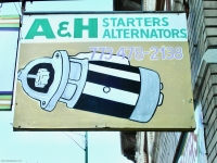 Trade sign with starter image and shop name. A&H Starters and Alternators, Lawrence Avenue at Sacramento-Roadside Art
