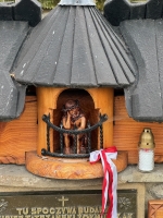 Pensive Jesus in a rustic setting