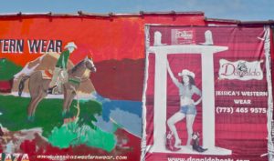 Cowboy and Cowgirl from wall art at Jessica's Western Wear
