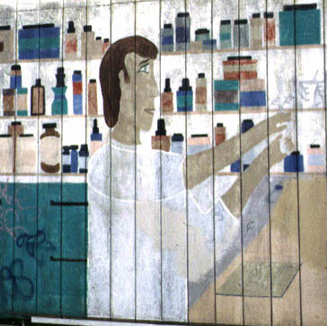 Hand-painted sign of muffler creature