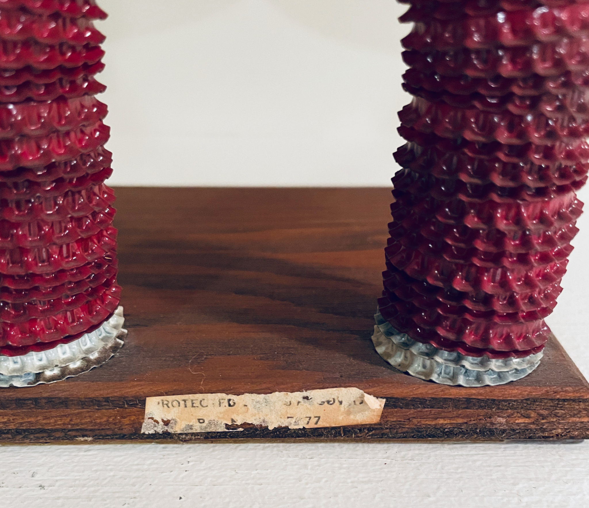 A patent on figures of this design was issued in 1970 to George Kasperan Jr. of Connecticut. This figure bears a  label with patent number D217,277, as do many similar figures