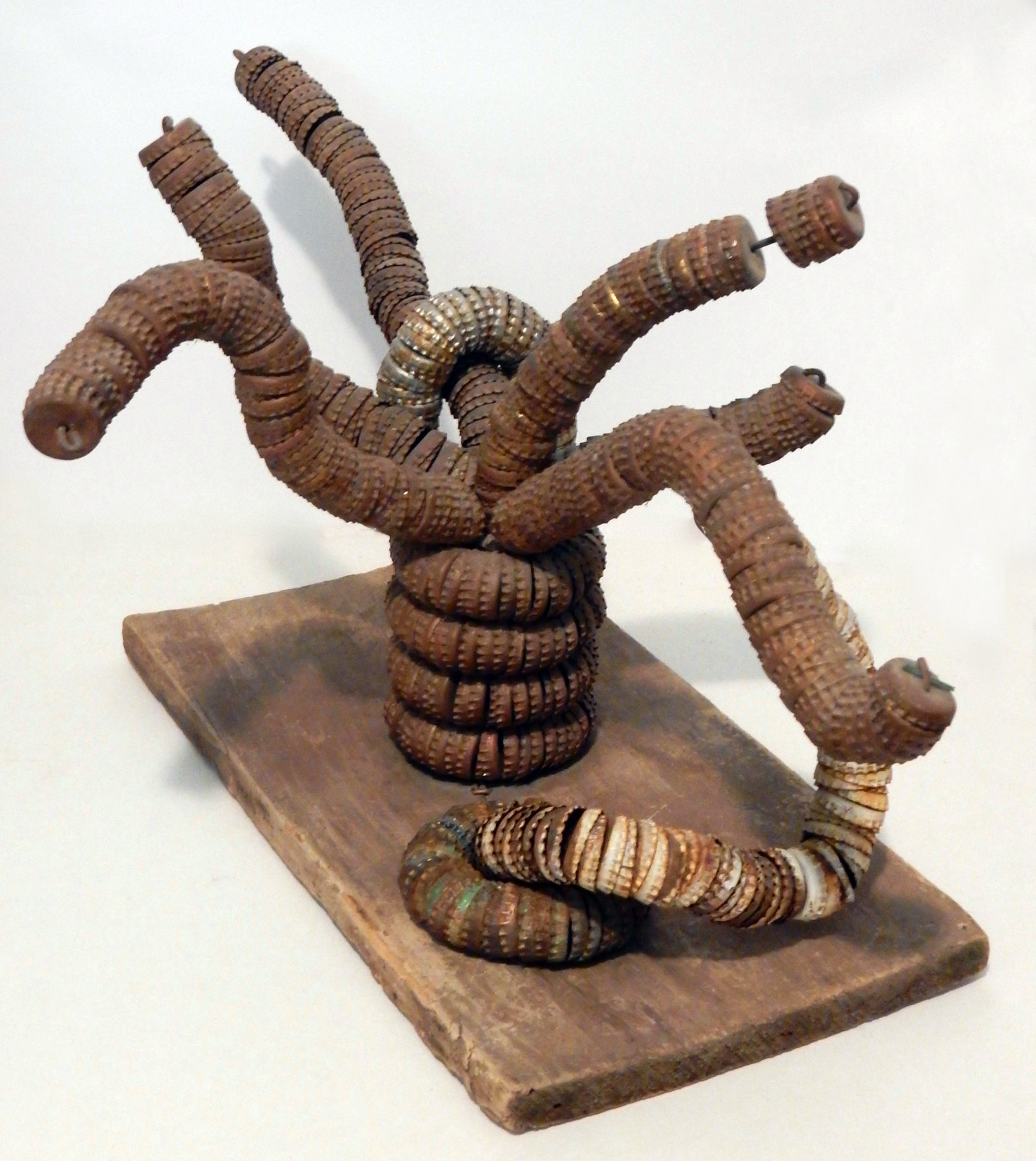 Bottle-cap tree by Clarence and Grace Woolsey