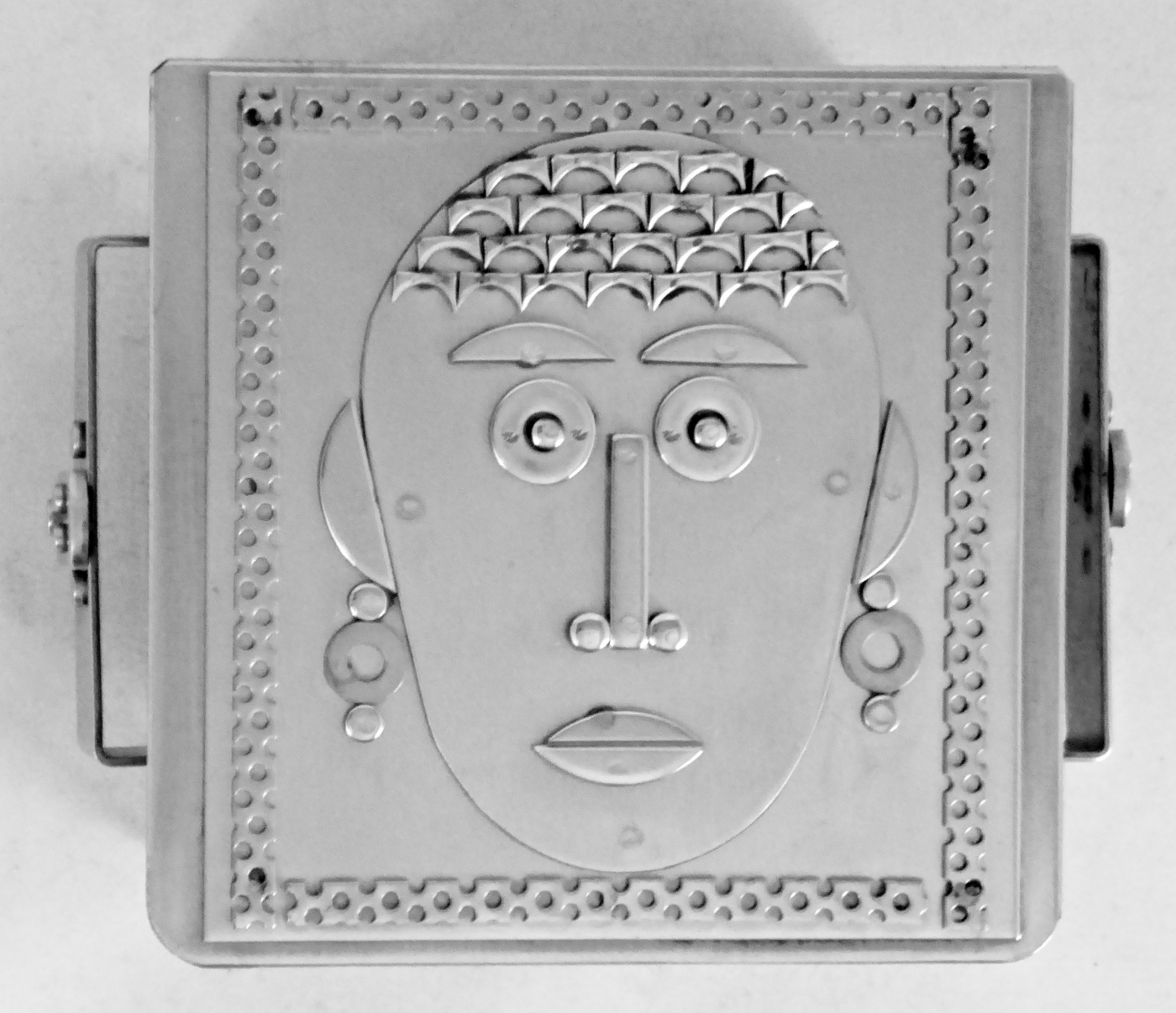 Stanley Szwarc stainless steel face box